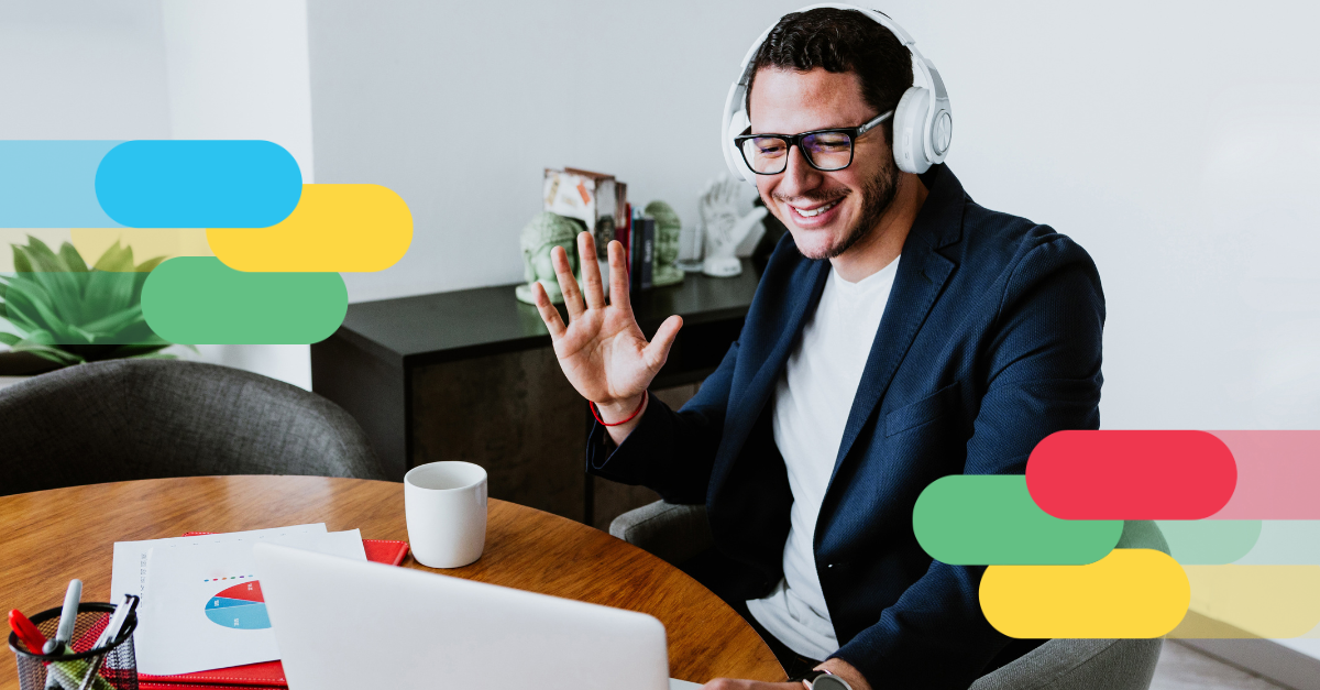 Man in a virtual meeting waving